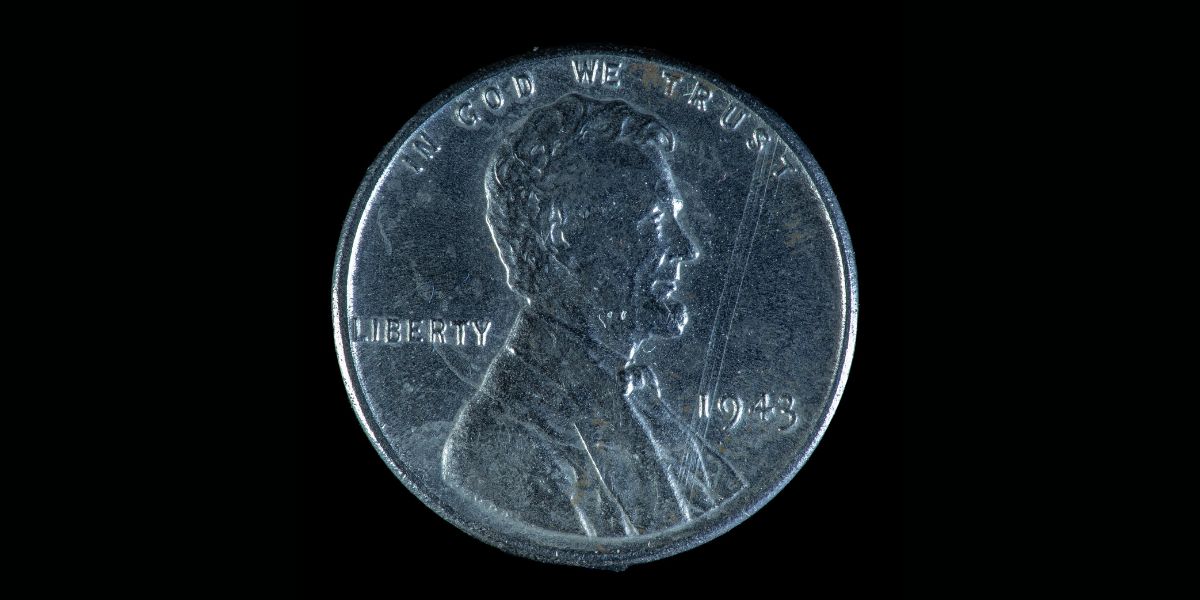 A U.S. 1943 steel penny against a black background