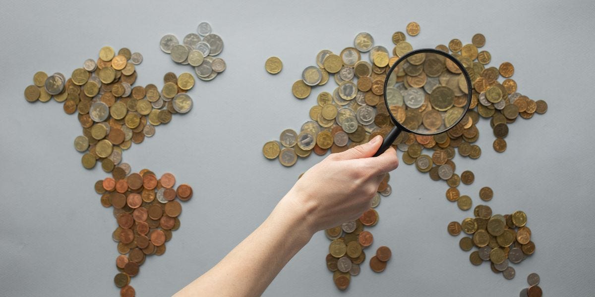 A pile of rare coins in the shape of all continents